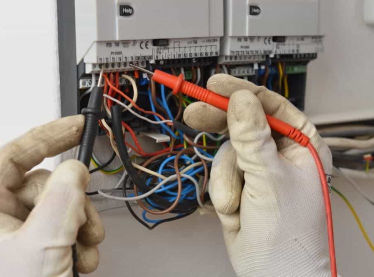 Testing electrical wires — Electrical & Air-Conditioning in Coomera, QLD